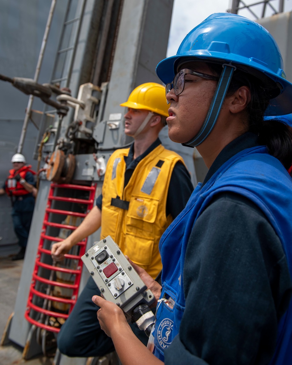 Boatswain’s Mate Seaman Kaitlyn Alfaro, from Los Angeles, Calif., operates a sliding padeye during a replenishment-at-sea