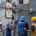 Sailors prepare a wench during a replenishment-at-sea