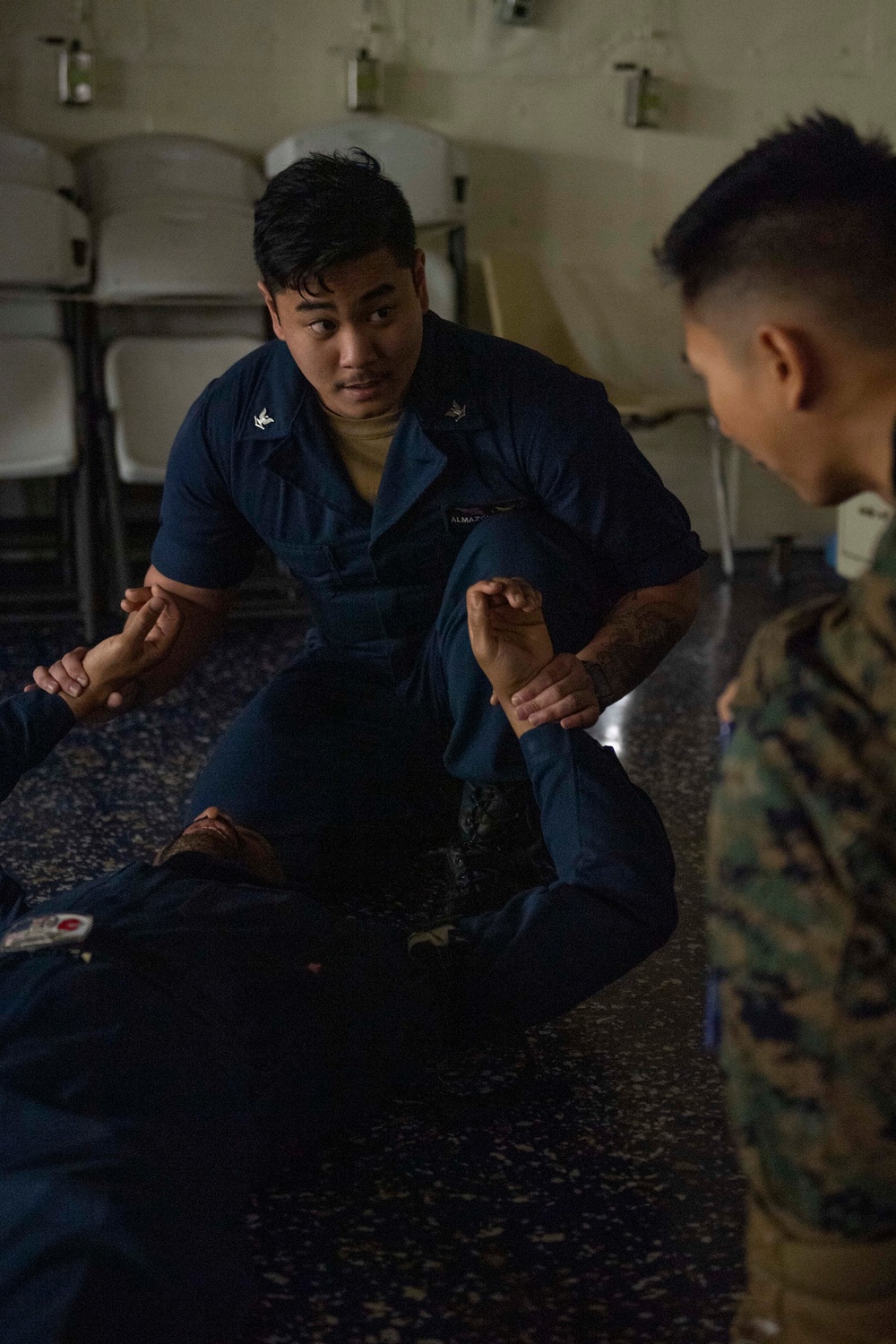 Sailors participate in a Tactical Casualty Combat Care class