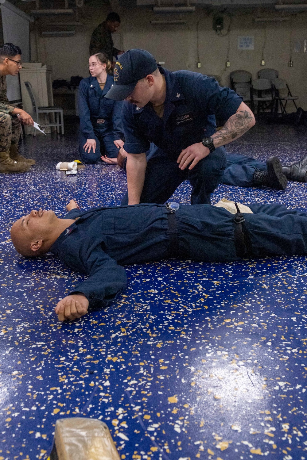 Sailors participate in Tactical Casualty Combat Care class.