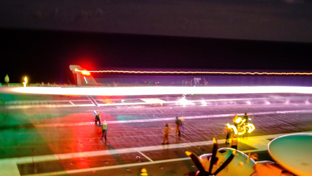 USS RONALD REAGAN conducts night flight operations in the Indian Ocean