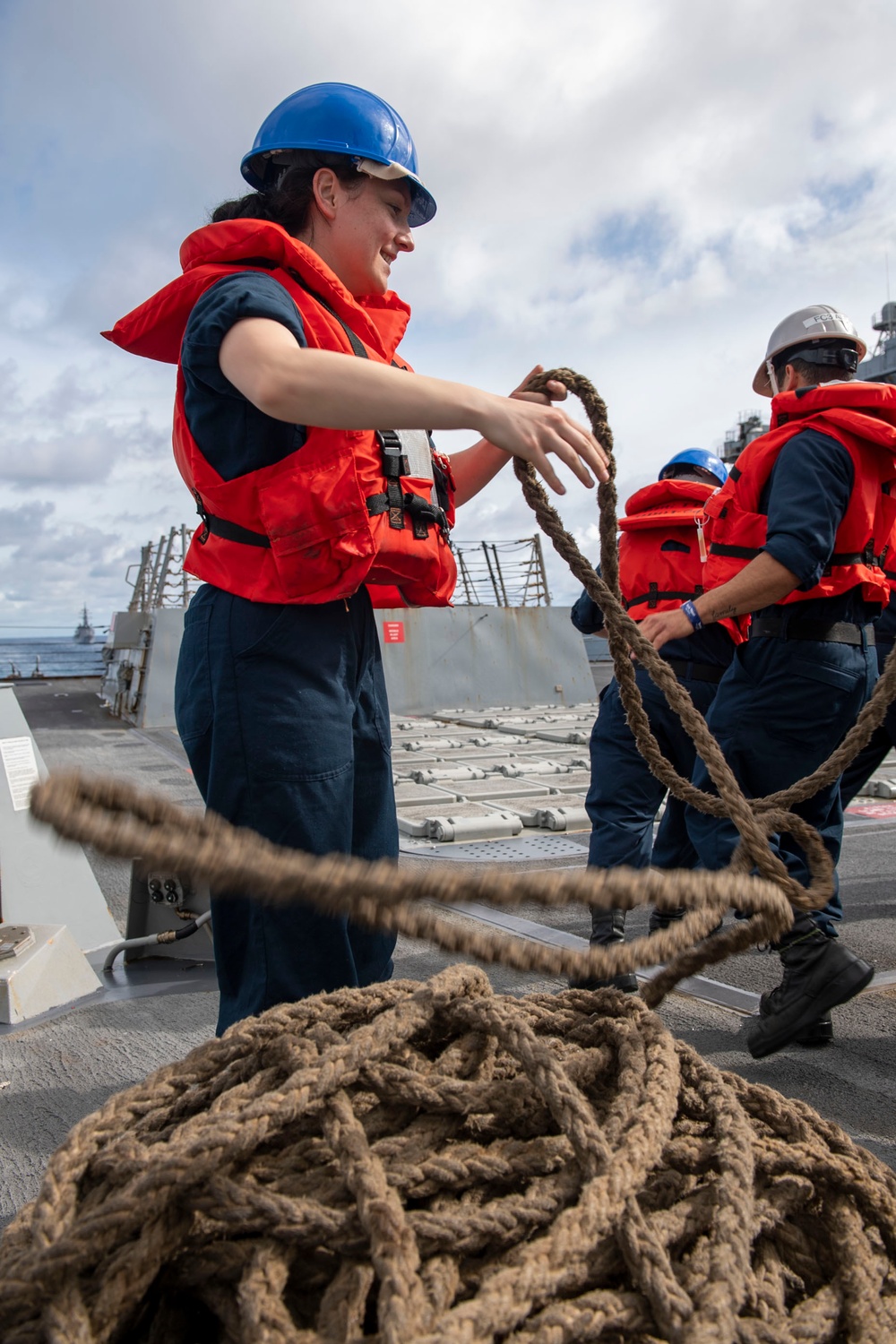 Operations Specialist Seaman Apprentice Abigail Dalton, from Dayton, Ohio, heaves a line