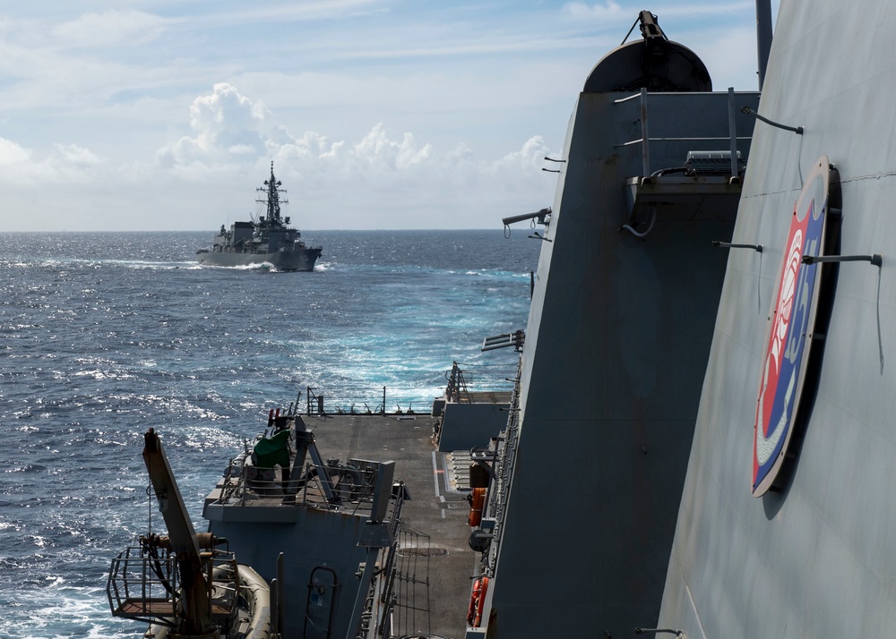 USS Rafael Peralta (DDG 115) operates with Japanese Maritime Self Defense Force Takanami-class destroyer JS Makinami (DD 112)