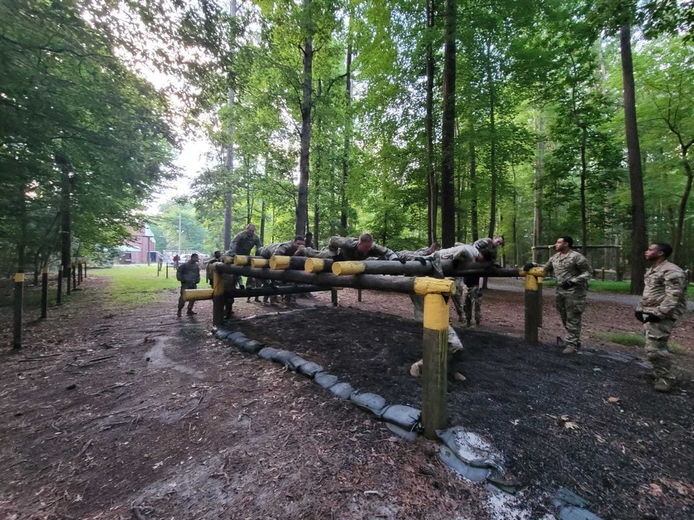 U.S. Army Soldiers Attending Advance Leaders Course complete the Obstacle Course