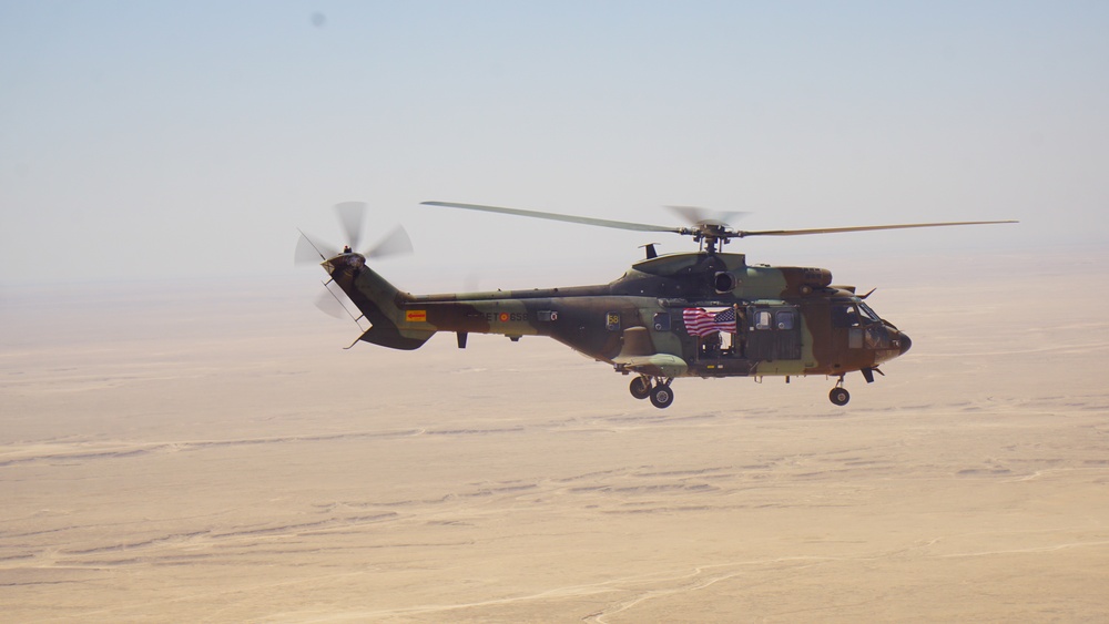 U.S. and Spanish helicopters fly together over Iraq