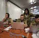 Romanian service members running tests on communication capabilities.