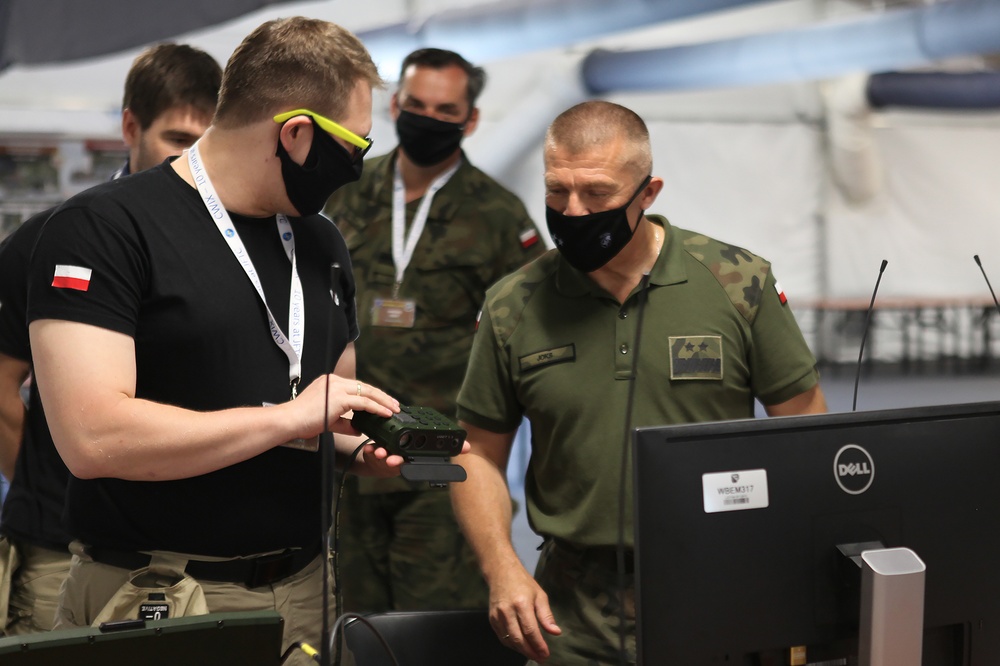 Polish service members demonstrate U-gate at CWIX 2021.