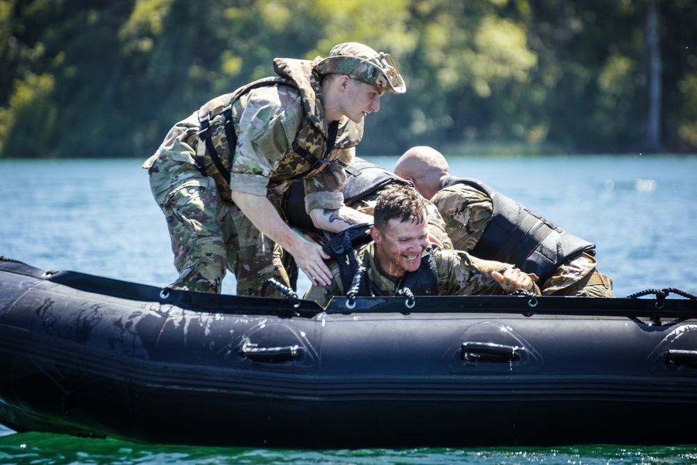 Washington Army National Guard members recover fellow soldiers after helo cast training jump