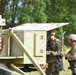 Michigan National Guard Soldiers set up satellite communications during annual training