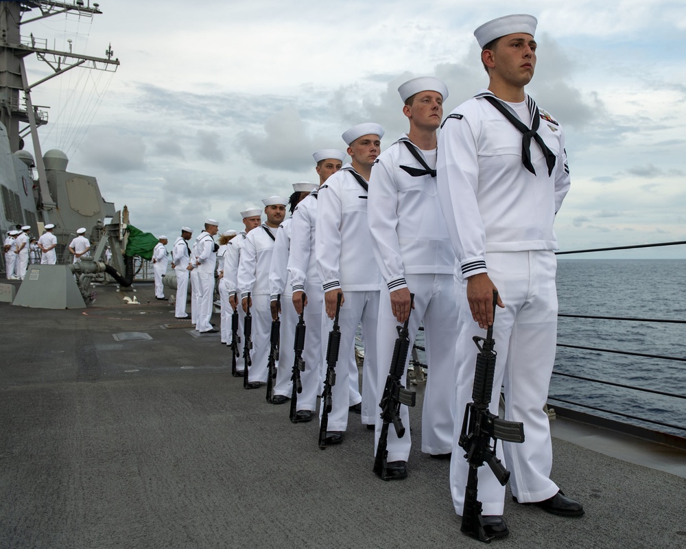 Sailors stand in formation during a remembrance ceremony for the Solomon Islands campaign