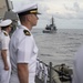 Sailors man the rails during a remembrance ceremony for the Solomon Islands campaign with Japanese Maritime Self Defense Force Takanami-class destroyer JS Makinami (DD 112)