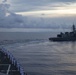 Sailors render honors for those lost during the during the Solomon Islands campaign during a remembrance ceremony with Japanese Maritime Self Defense Force Takanami-class destroyer JS Makinami (DD 112)