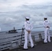 Sailors man the rails during a remembrance ceremony for the Solomon Islands campaign with Japanese Maritime Self Defense Force Takanami-class destroyer JS Makinami (DD 112)