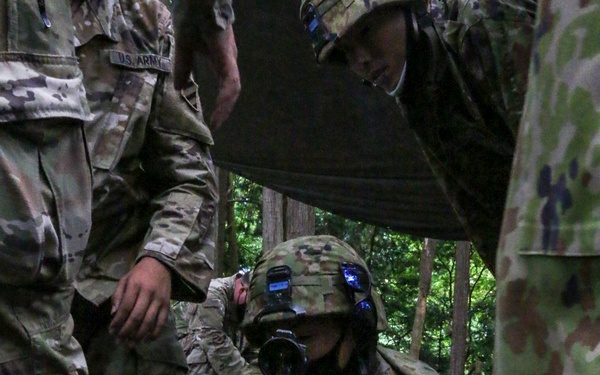 U.S. and Japanese forces train on weapon skills together during Orient Shield 21-2