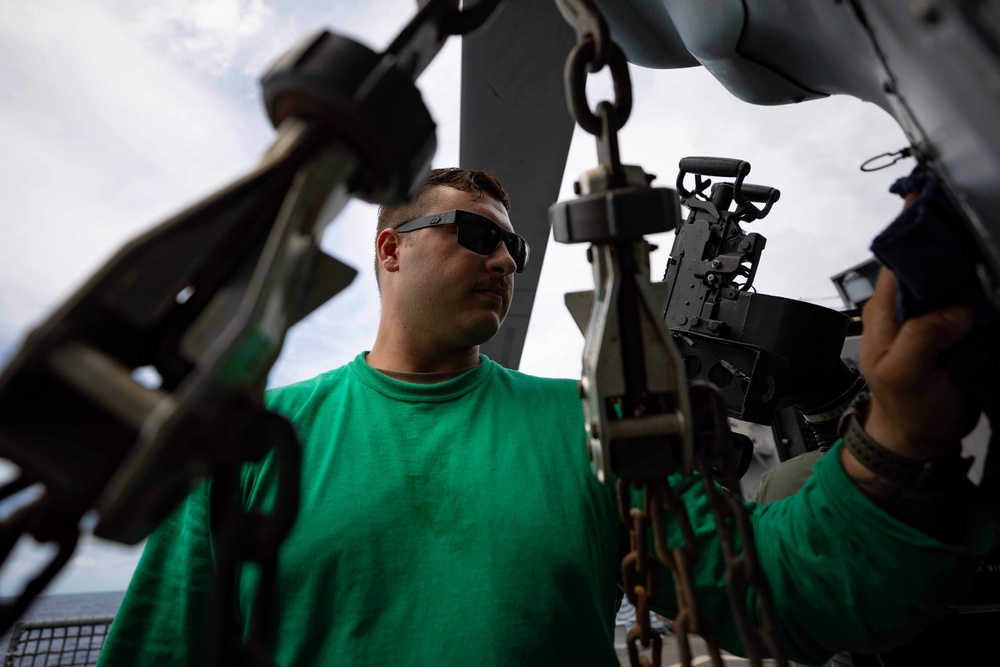 HSC 22 Sailor Conducts Maintenance on an MH-60S Seahawk Helicopter