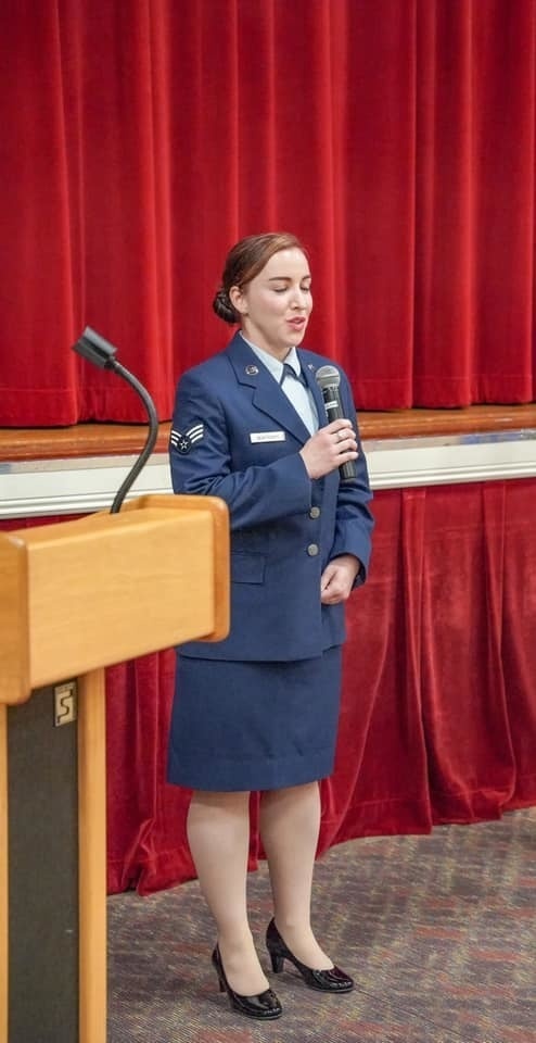 Airman sings National Anthem