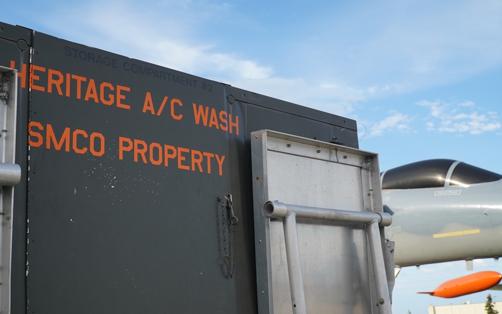 JBER volunteers wash static displays at Heritage Park