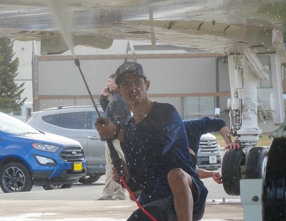 JBER volunteers wash static displays at Heritage Park