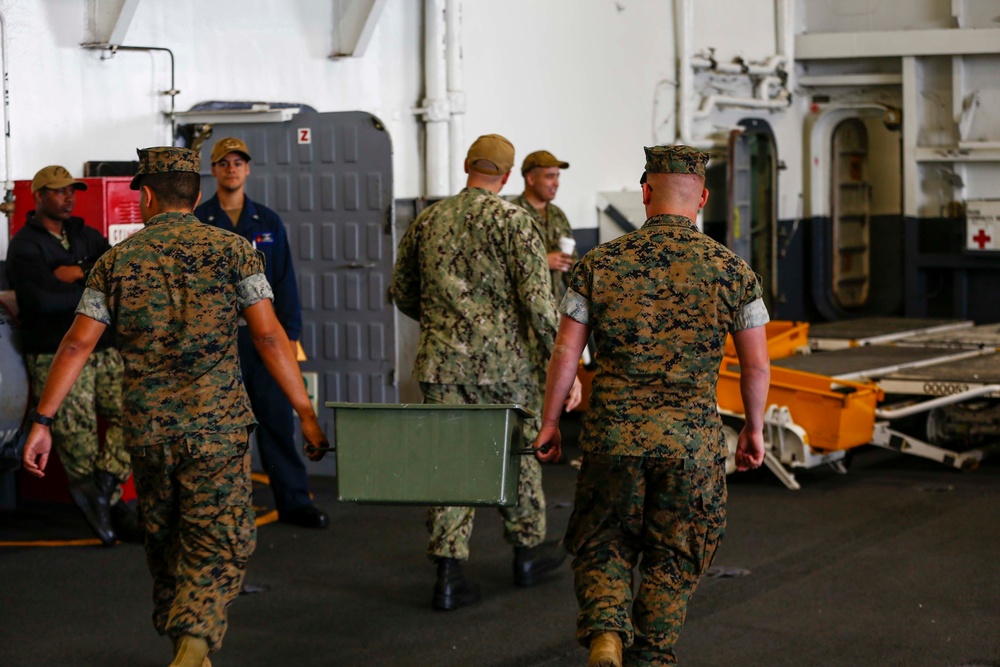 VMFA-314 Unload gear aboard USS Abraham Lincoln