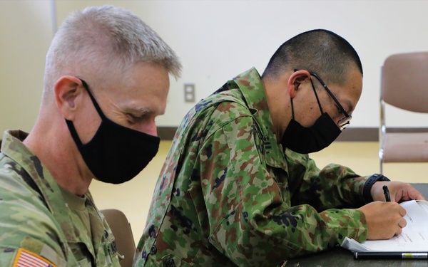 USARJ G3 and JGSDF 4th Field Artillery Group commander sign the memorandum of agreement for live fire during Orient Shield 21-2