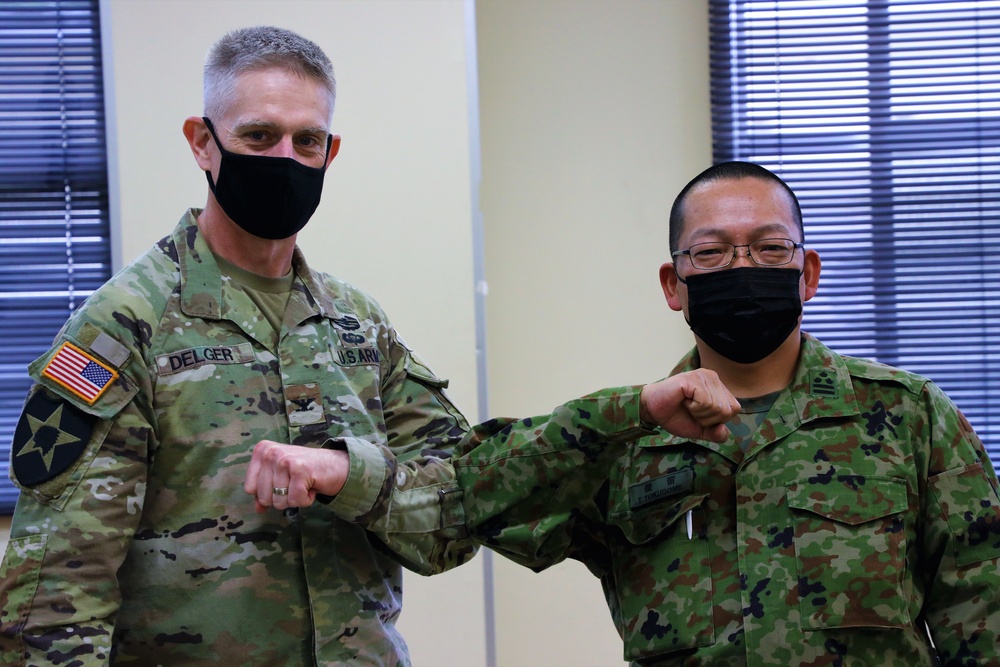 USARJ G3 and JGSDF 4th Field Artillery Group commander sign the memorandum of agreement for live fire during Orient Shield 21-2