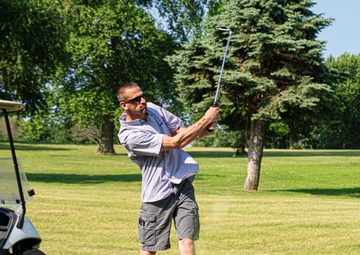 Community and Airmen come together to golf for a cause