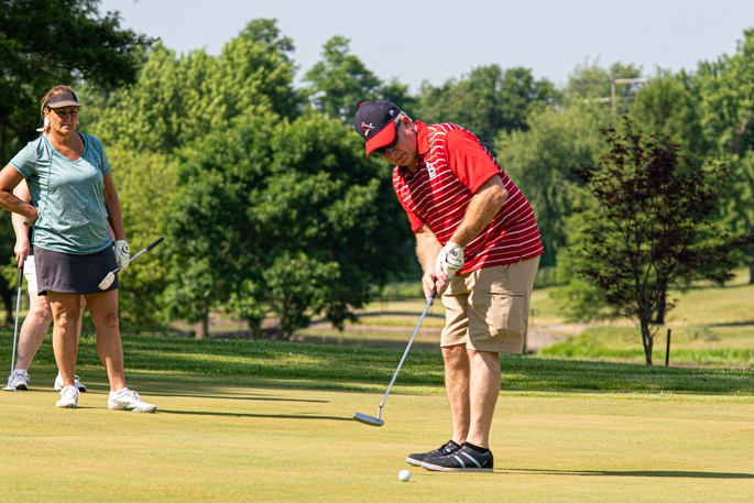 Community and Airmen come together to golf for a cause