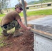 NMCB 11 Places Concrete Slab for Gazebo on Camp Covington