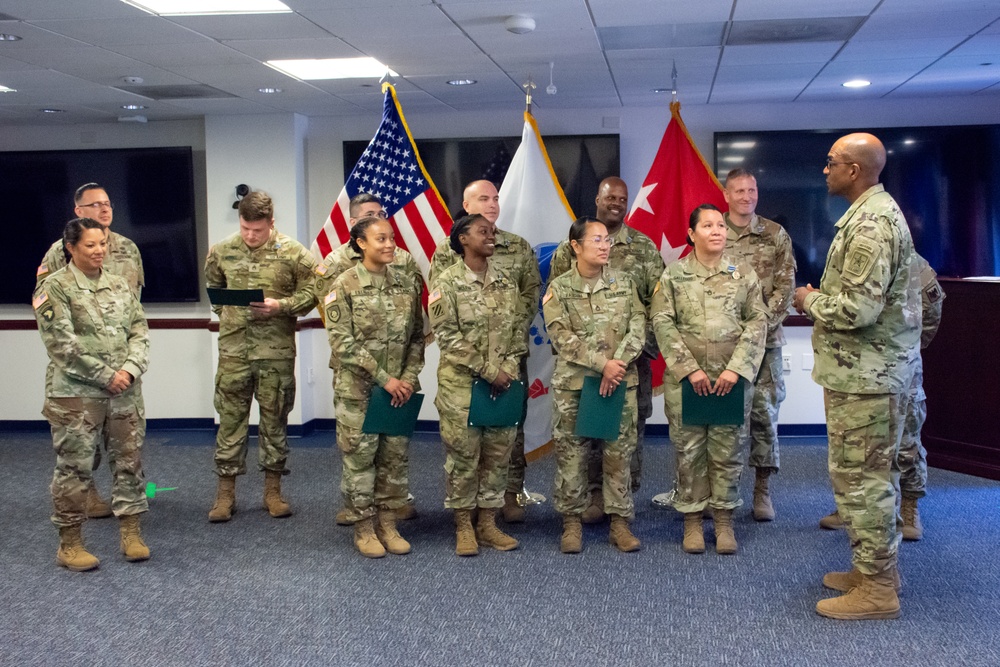 Army G1 Leadership presents impact awards to members of the IPPS-A Program