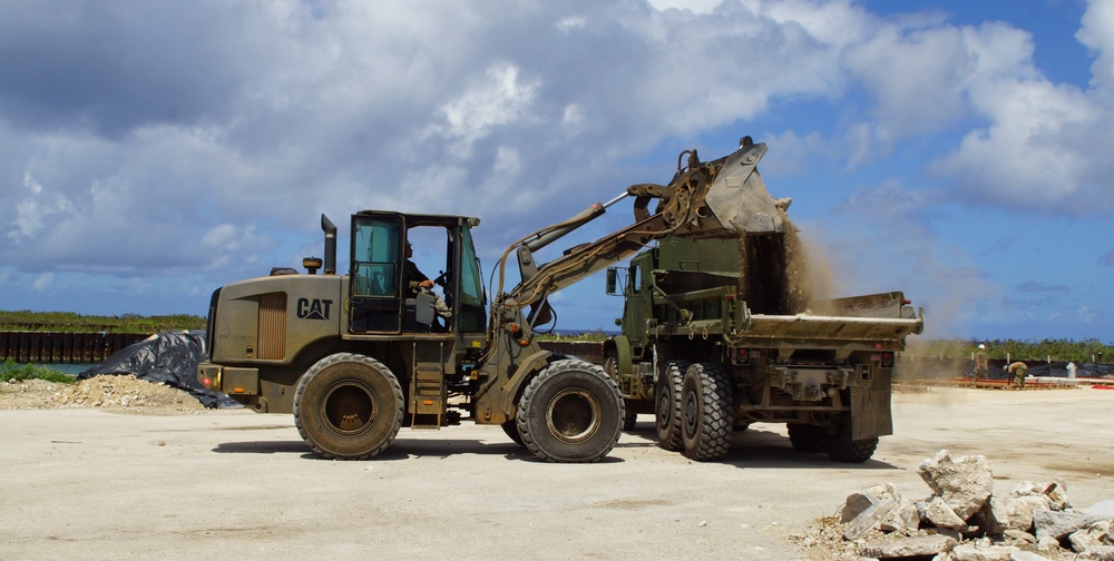 NMCB 4 and 7th ESB remove debris from Port of Tinian