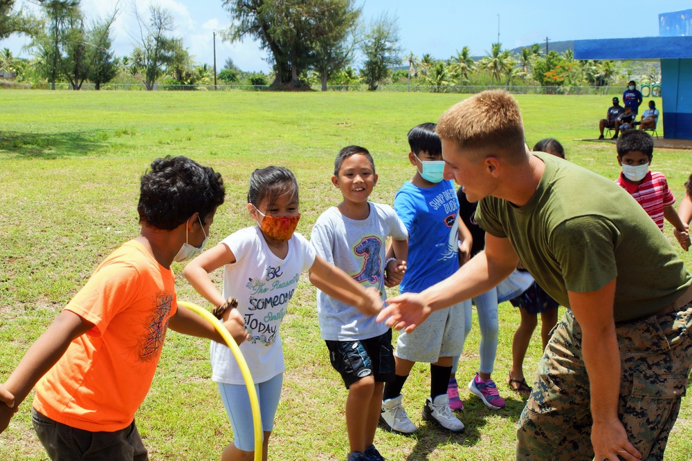 NMCB 4 and 7th ESB volunteer at Tinian Elementary School