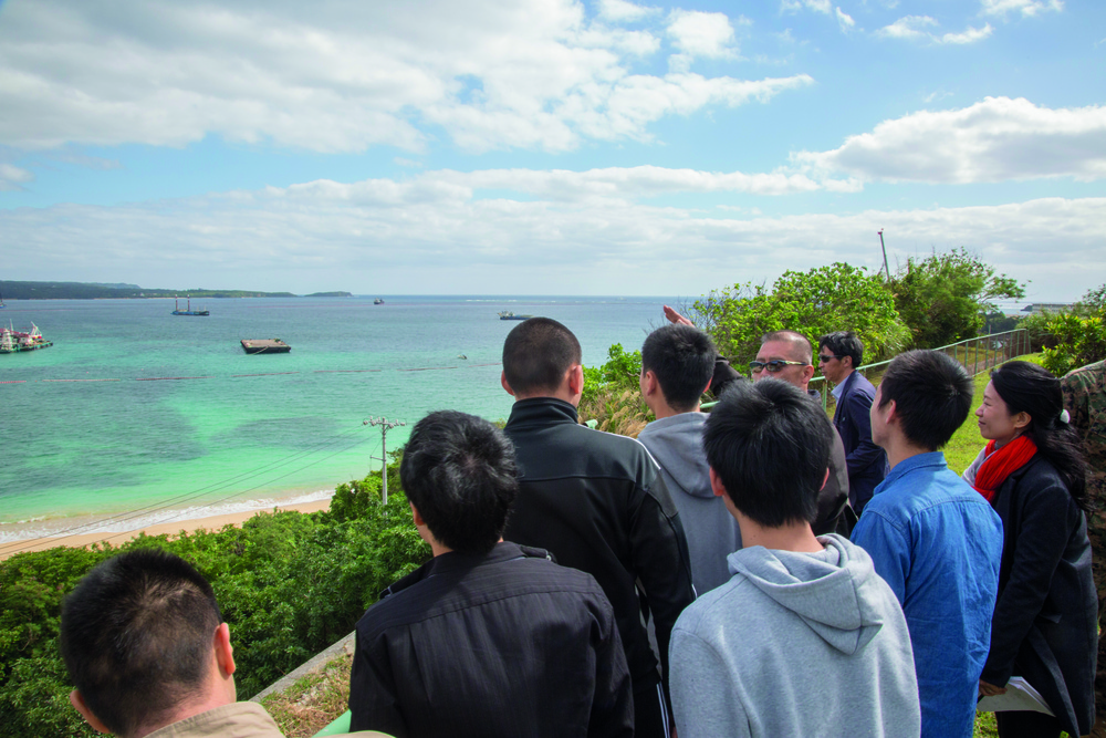 Seeing is believing: Japanese High School students from mainland visit Camp Schwab on a school trip