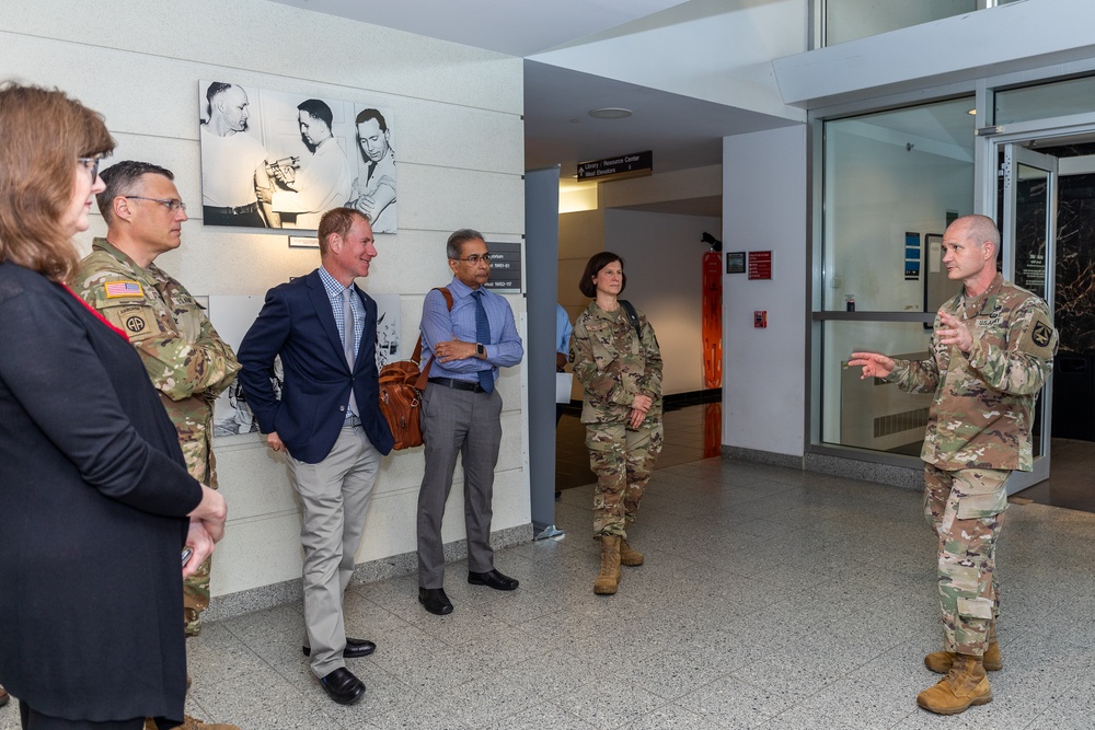 Interim Dean of Uniformed Services University School of Medicine, Captain Eric Elster, Visits Walter Reed Army Institute of Research