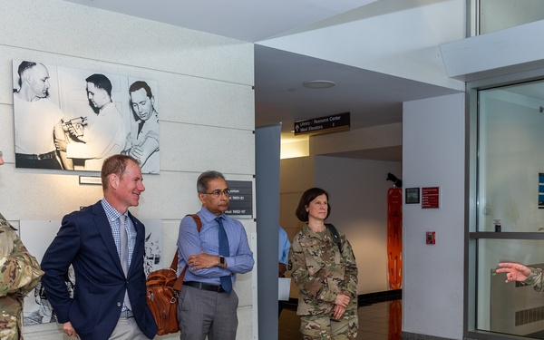 Interim Dean of Uniformed Services University School of Medicine, Captain Eric Elster, Visits Walter Reed Army Institute of Research