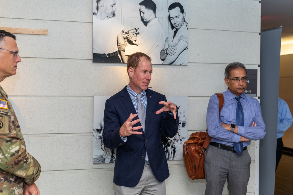 Interim Dean of Uniformed Services University School of Medicine, Captain Eric Elster, Visits Walter Reed Army Institute of Research