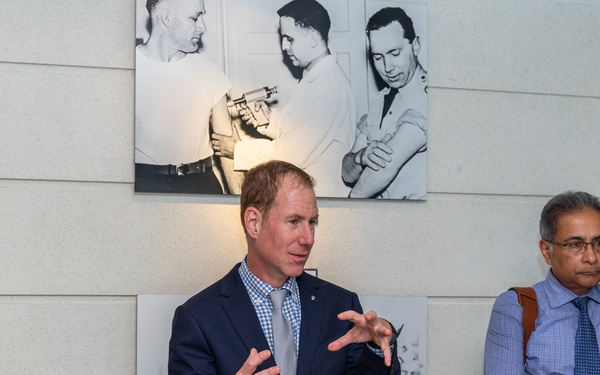 Interim Dean of Uniformed Services University School of Medicine, Captain Eric Elster, Visits Walter Reed Army Institute of Research