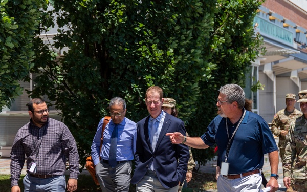 Interim Dean of Uniformed Services University School of Medicine, Captain Eric Elster, Visits Walter Reed Army Institute of Research