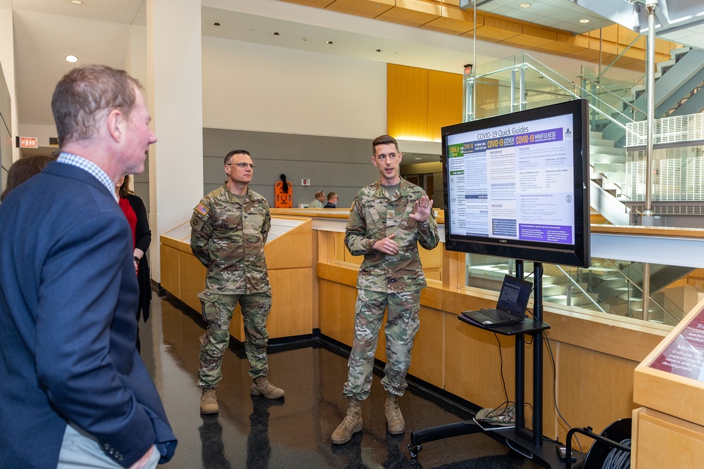 Interim Dean of Uniformed Services University School of Medicine, Captain Eric Elster, Visits Walter Reed Army Institute of Research