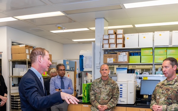 Interim Dean of Uniformed Services University School of Medicine, Captain Eric Elster, Visits Walter Reed Army Institute of Research