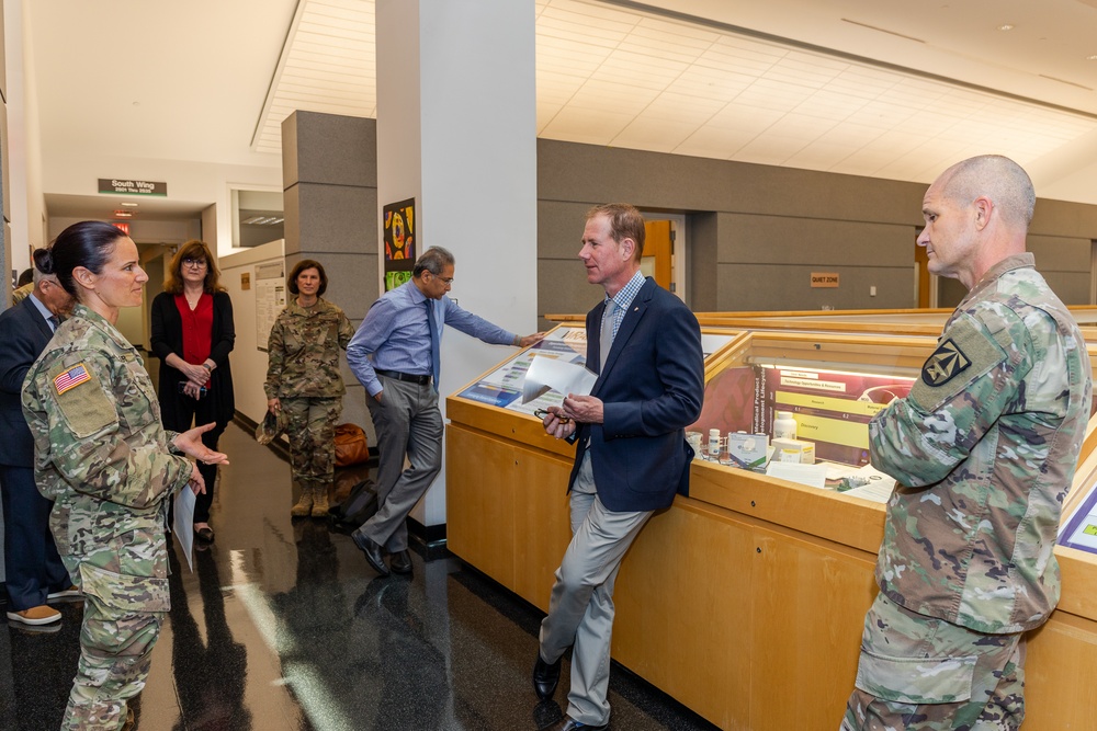 Interim Dean of Uniformed Services University School of Medicine, Captain Eric Elster, Visits Walter Reed Army Institute of Research