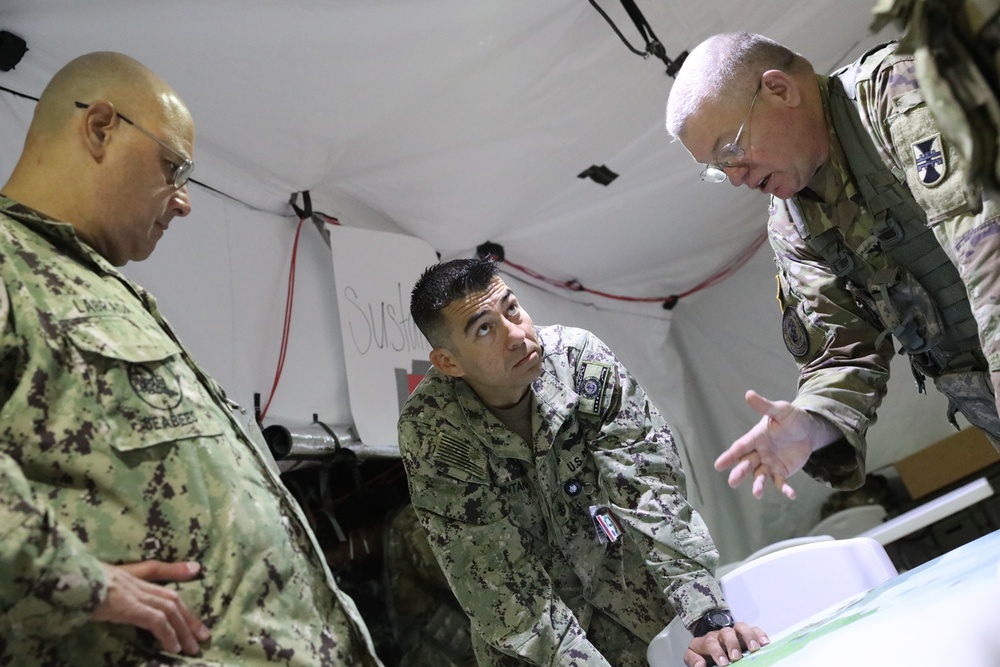 412th TEC Soldiers plan next move during annual exercise.