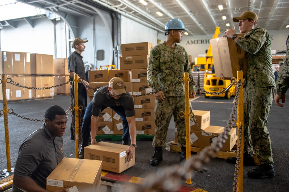Sailors Receive Supplies Aboard USS Carl Vinson (CVN 70)