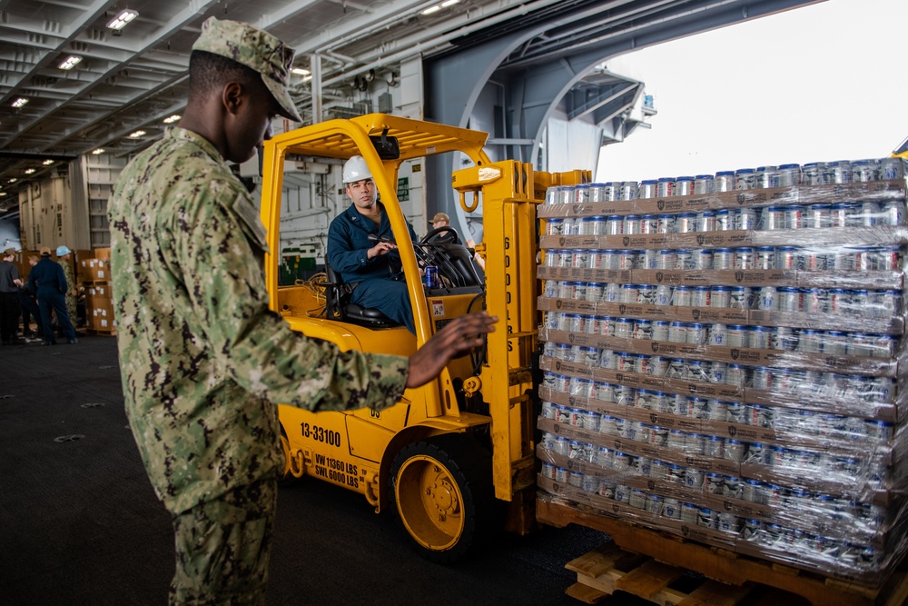 Sailors Receive Supplies Aboard USS Carl Vinson (CVN 70)