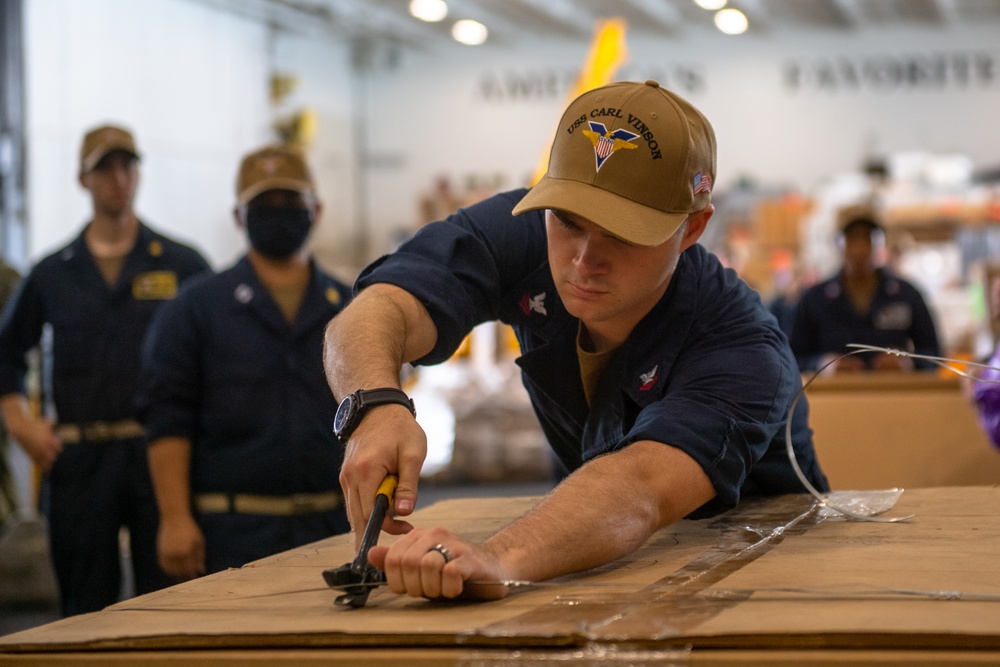 Sailors Receive Supplies Aboard USS Carl Vinson (CVN 70)