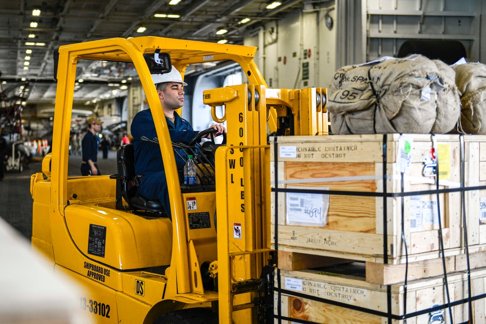 Sailors Receive Supplies Aboard USS Carl Vinson (CVN 70)
