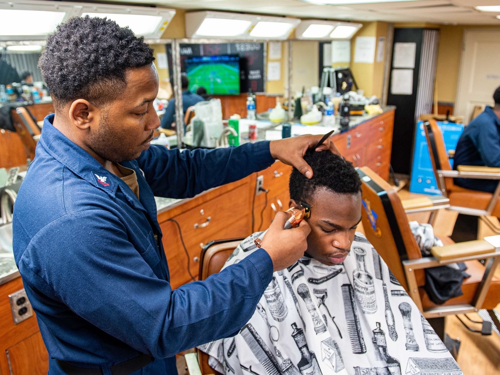 Sailor Receives Haircut