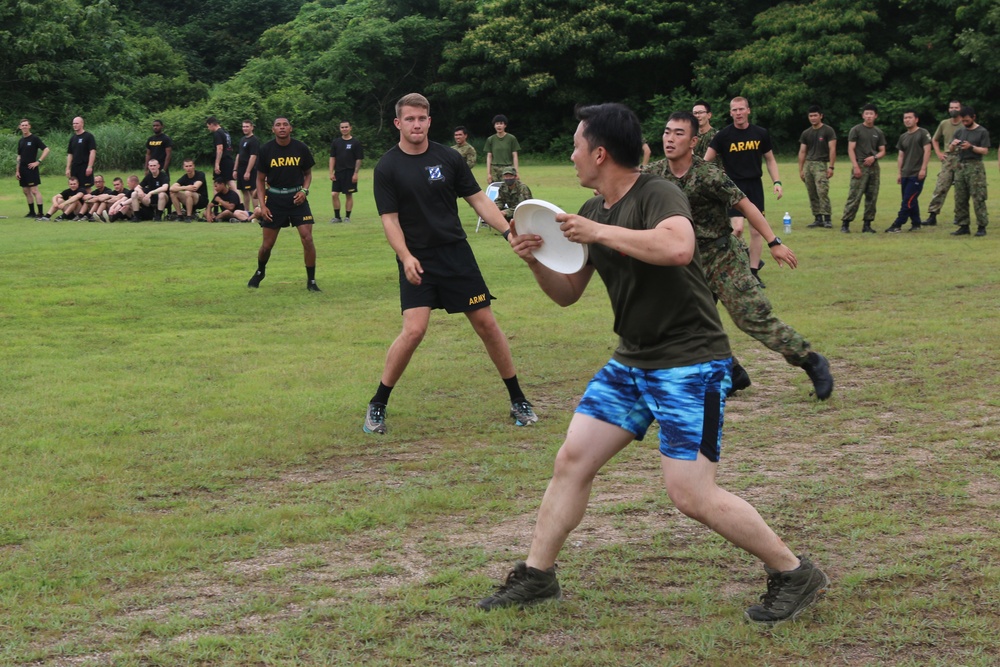 Black Lions and Japan Ground Self-Defense Force members take a break from training to compete in ultimate Frisbee tournament