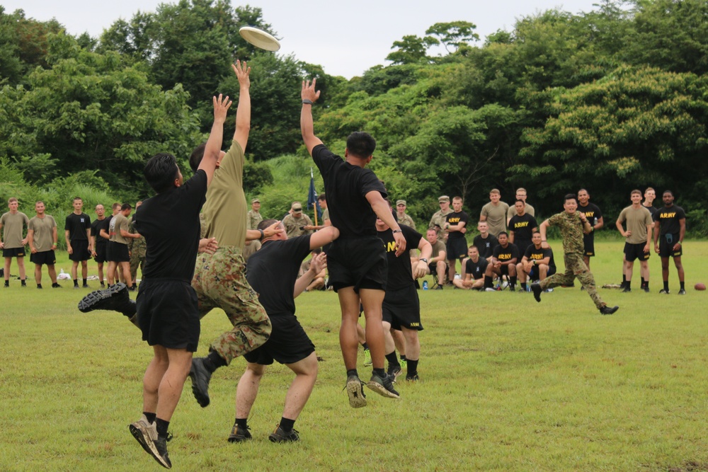 Black Lions and Japan Ground Self-Defense Force members take a break from training to compete in ultimate Frisbee tournament