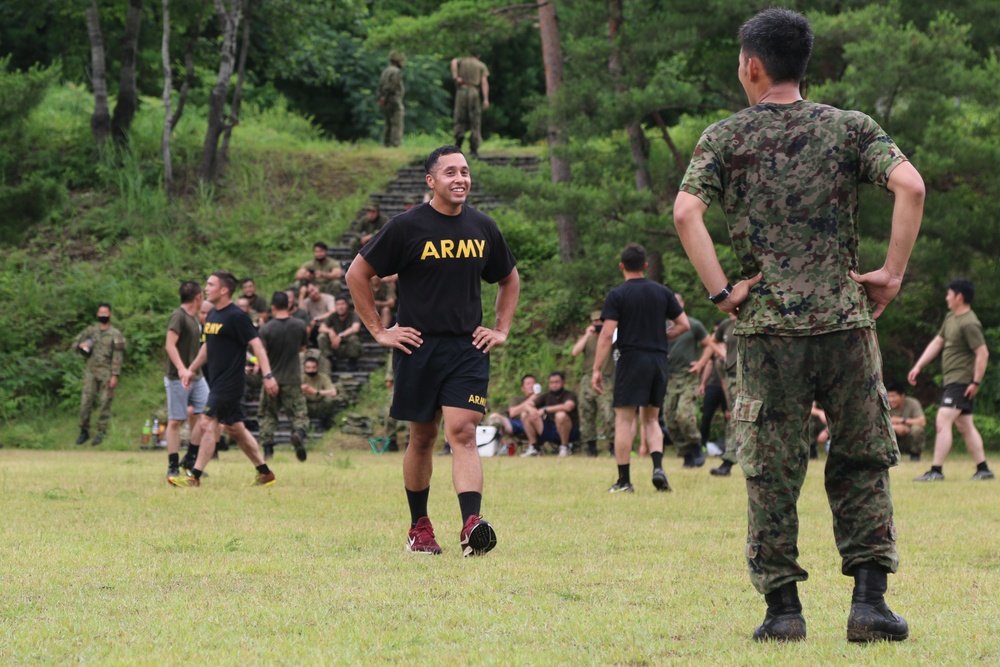 Black Lions and Japan Ground Self-Defense Force members take a break from training to compete in ultimate Frisbee tournament