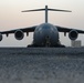 U.S. Airmen, Soldiers unload cargo, passengers